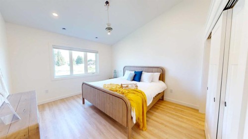 731 7 Avenue West, Cardston, AB - Indoor Photo Showing Bedroom