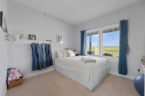 32325 Range Road 24, Rural Mountain View County, AB - Indoor Photo Showing Bedroom