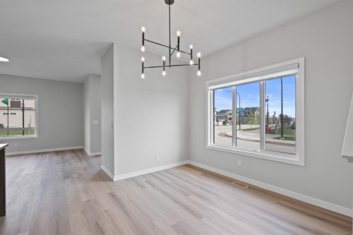 114 Lewiston Way Ne, Calgary, AB - Indoor Photo Showing Other Room