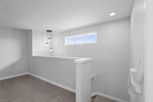 114 Lewiston Way Ne, Calgary, AB - Indoor Photo Showing Other Room