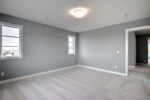 47 Agate Road, Cochrane, AB - Indoor Photo Showing Other Room