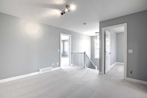 47 Agate Road, Cochrane, AB - Indoor Photo Showing Other Room