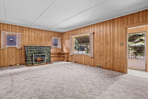 404 Otter Street, Banff, AB - Indoor With Fireplace