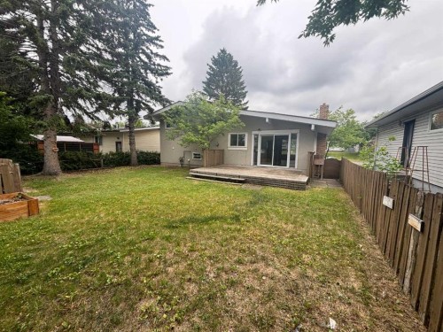 272 Acadia Drive Se, Calgary, AB - Outdoor With Backyard With Exterior