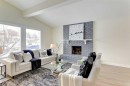 272 Acadia Drive Se, Calgary, AB  - Indoor Photo Showing Living Room With Fireplace 