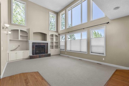86 Springborough Green Sw, Calgary, AB - Indoor Photo Showing Other Room With Fireplace