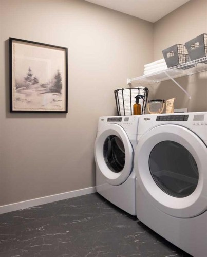 183 Sawgrass Gate Nw, Airdrie, AB - Indoor Photo Showing Laundry Room