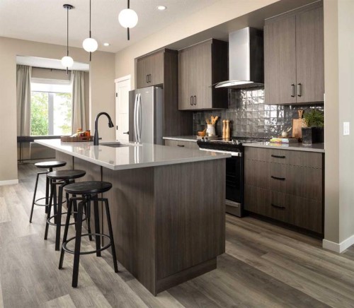183 Sawgrass Gate Nw, Airdrie, AB - Indoor Photo Showing Kitchen With Upgraded Kitchen