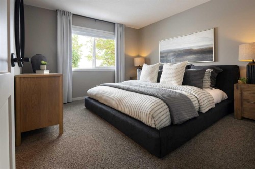 183 Sawgrass Gate Nw, Airdrie, AB - Indoor Photo Showing Bedroom