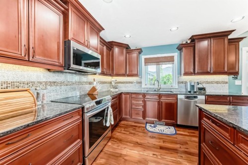 52 Winter Drive, Olds, AB - Indoor Photo Showing Kitchen With Stainless Steel Kitchen