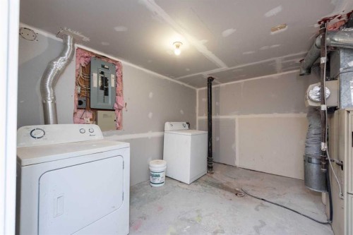 5407 14 Avenue Se, Calgary, AB - Indoor Photo Showing Laundry Room