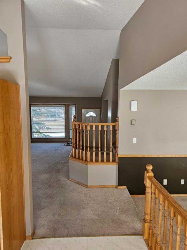 302 Meadowbrook Bay Se, Airdrie, AB - Indoor Photo Showing Other Room