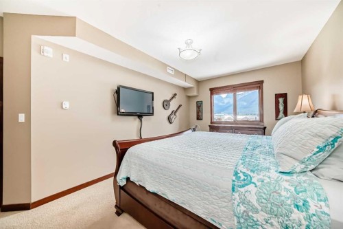 311-1002 8 Avenue, Canmore, AB - Indoor Photo Showing Bedroom