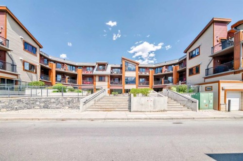 311-1002 8 Avenue, Canmore, AB - Outdoor With Facade