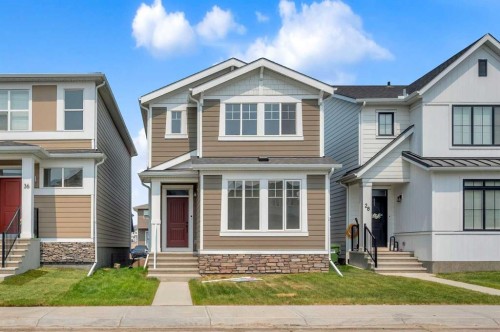 32 Rowmont Common Nw, Calgary, AB - Outdoor With Facade