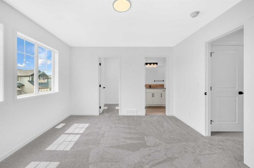 32 Rowmont Common Nw, Calgary, AB - Indoor Photo Showing Other Room