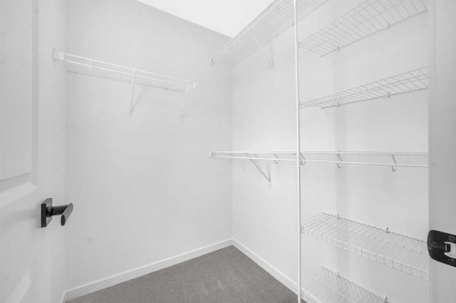 32 Rowmont Common Nw, Calgary, AB - Indoor With Storage