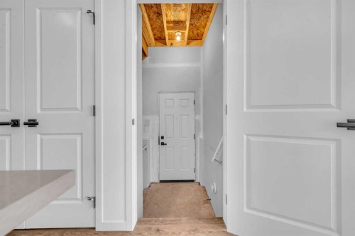 32 Rowmont Common Nw, Calgary, AB - Indoor Photo Showing Other Room
