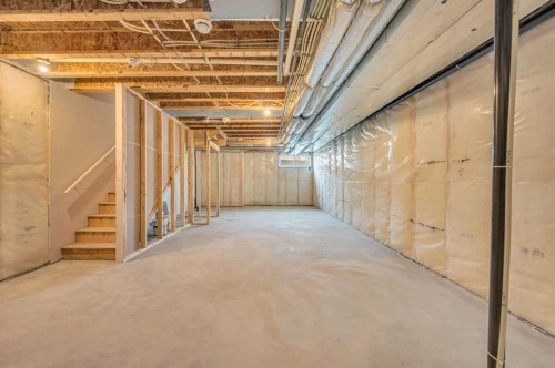 32 Rowmont Common Nw, Calgary, AB - Indoor Photo Showing Basement