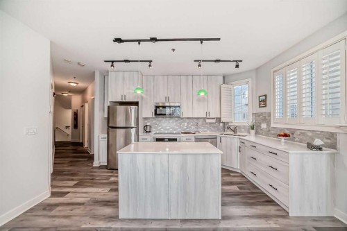 201-3412 Parkdale Boulevard NW Calgary, AB T2N 3T4