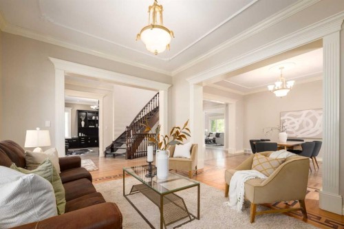 57 Slopes Point Sw, Calgary, AB - Indoor Photo Showing Living Room