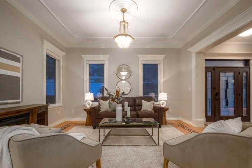 57 Slopes Point Sw, Calgary, AB - Indoor Photo Showing Living Room