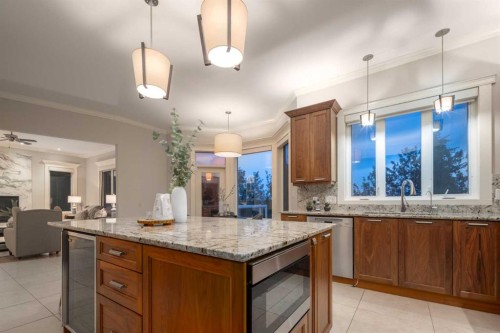 57 Slopes Point Sw, Calgary, AB - Indoor Photo Showing Kitchen With Upgraded Kitchen