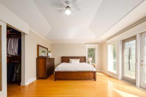 57 Slopes Point Sw, Calgary, AB - Indoor Photo Showing Bedroom