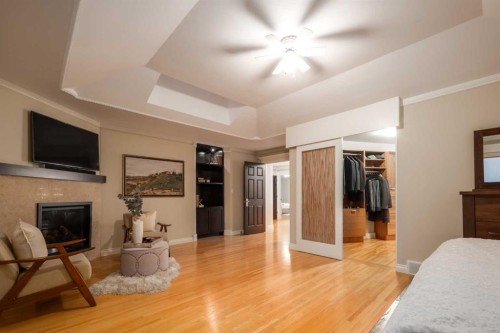 57 Slopes Point Sw, Calgary, AB - Indoor With Fireplace