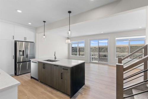 4067 Sawgrass Street Nw, Airdrie, AB - Indoor Photo Showing Kitchen With Upgraded Kitchen