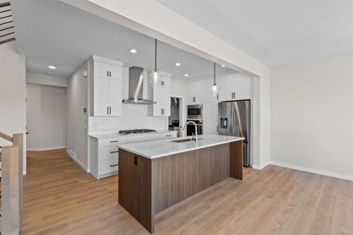 4067 Sawgrass Street Nw, Airdrie, AB - Indoor Photo Showing Kitchen With Upgraded Kitchen