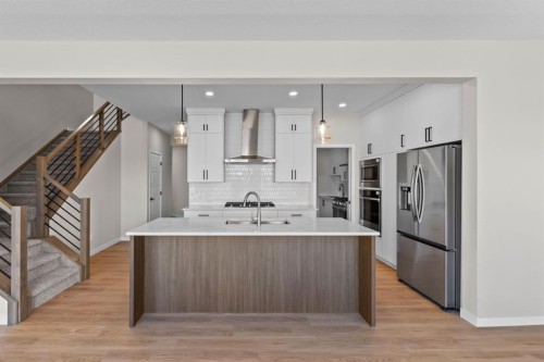 4067 Sawgrass Street Nw, Airdrie, AB - Indoor Photo Showing Kitchen With Upgraded Kitchen