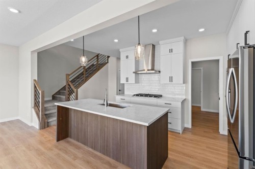 4067 Sawgrass Street Nw, Airdrie, AB - Indoor Photo Showing Kitchen With Upgraded Kitchen