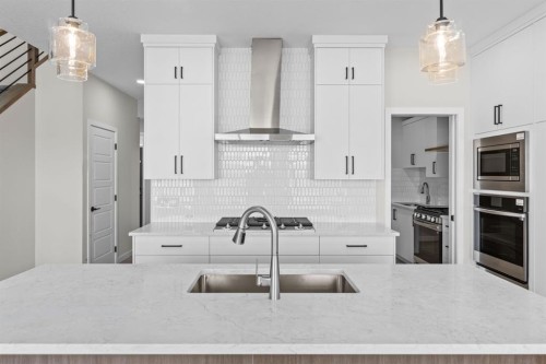 4067 Sawgrass Street Nw, Airdrie, AB - Indoor Photo Showing Kitchen With Upgraded Kitchen