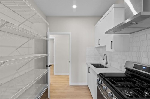 4067 Sawgrass Street Nw, Airdrie, AB - Indoor Photo Showing Kitchen With Double Sink
