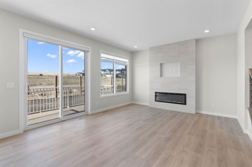 4067 Sawgrass Street Nw, Airdrie, AB - Indoor Photo Showing Living Room With Fireplace