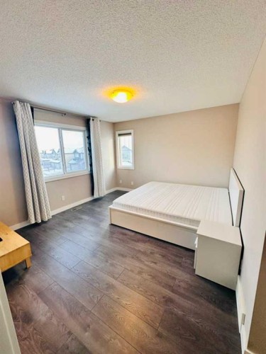225 Panatella Square Nw, Calgary, AB - Indoor Photo Showing Other Room