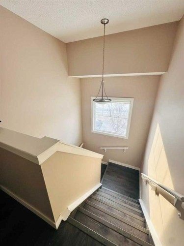 225 Panatella Square Nw, Calgary, AB - Indoor Photo Showing Other Room