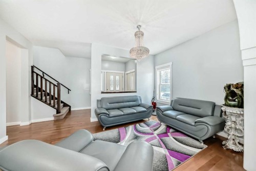 104 Panamount Terrace Nw, Calgary, AB - Indoor Photo Showing Living Room