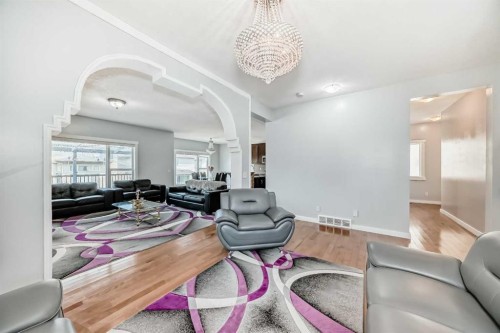 104 Panamount Terrace Nw, Calgary, AB - Indoor Photo Showing Living Room