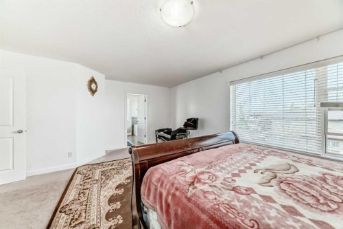 104 Panamount Terrace Nw, Calgary, AB - Indoor Photo Showing Bedroom