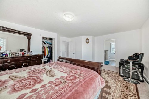 104 Panamount Terrace Nw, Calgary, AB - Indoor Photo Showing Bedroom