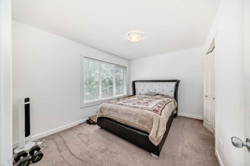 104 Panamount Terrace Nw, Calgary, AB - Indoor Photo Showing Bedroom