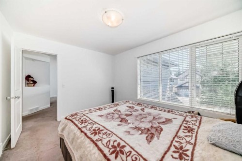 104 Panamount Terrace Nw, Calgary, AB - Indoor Photo Showing Bedroom