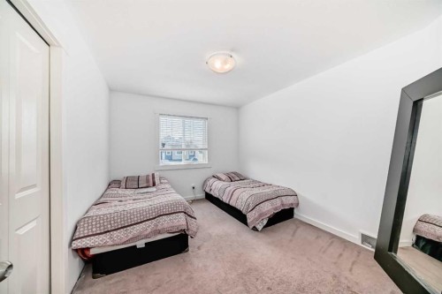 104 Panamount Terrace Nw, Calgary, AB - Indoor Photo Showing Bedroom