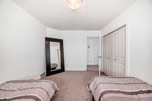 104 Panamount Terrace Nw, Calgary, AB - Indoor Photo Showing Bedroom