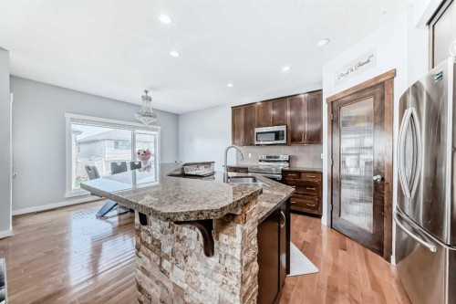 104 Panamount Terrace Nw, Calgary, AB - Indoor Photo Showing Kitchen With Stainless Steel Kitchen