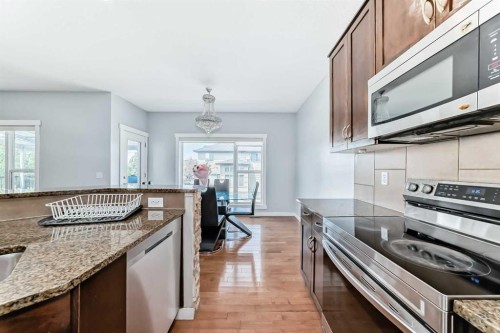 104 Panamount Terrace Nw, Calgary, AB - Indoor Photo Showing Kitchen With Upgraded Kitchen