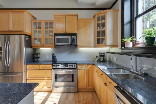1-804 18 Avenue Sw, Calgary, AB - Indoor Photo Showing Kitchen With Stainless Steel Kitchen With Double Sink