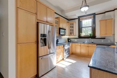 1-804 18 Avenue Sw, Calgary, AB - Indoor Photo Showing Kitchen With Stainless Steel Kitchen